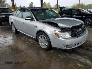 2009 Ford Taurus Limited with VIN 1FAHP25W09G100990, listed as a Copart auction lot 80745234 with 129,692 mi miles and Salvage Title. Bid and sale history available at carsss.com. Image 4.