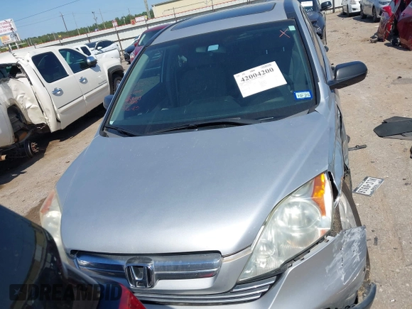 2009 Honda CR-V EX with VIN 3CZRE38559G705051, listed as a IAAI auction lot 42004200 with 185,218 mi miles and . Bid and sale history available at carsss.com. Image 12.