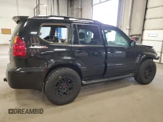 2004 Lexus GX 470 with VIN JTJBT20X740025411, listed as a Copart auction lot 55363145 with 329,164 mi miles and Salvage Title. Bid and sale history available at DreamBid. Image 3.
