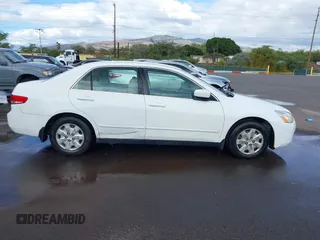 2004 Honda Accord LX with VIN JHMCM56344C005690, listed as a IAAI auction lot 41360785 with 132,915 mi miles and . Bid and sale history available at DreamBid. Image 13.