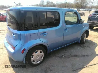 2013 Nissan Cube SL z VIN JN8AZ2KR3DT303672, wystawiony jako IAAI lot #41899753 z przebiegiem 117 840 mil mil oraz . Historia ofert i sprzedaży dostępna na DreamBid. Obrazek 4.