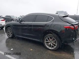2018 Alfa Romeo Stelvio z VIN ZASFAKANXJ7C23921, wystawiony jako IAAI lot #38783836 z przebiegiem 93 482 mil mil oraz . Historia ofert i sprzedaży dostępna na DreamBid. Obrazek 14.