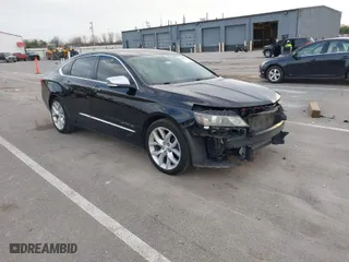 2014 Chevrolet Impala LTZ with VIN 2G1155S31E9211885, listed as a IAAI auction lot 41804249 with 149,066 mi miles. Bid and sale history available at carsss.com. Image 1.