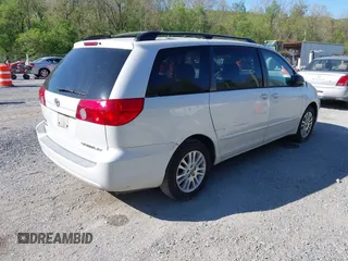 2008 Toyota Sienna XLE with VIN 5TDZK22C08S100113, listed as a IAAI auction lot 42118757 with 232,372 mi miles and . Bid and sale history available at DreamBid. Image 4.