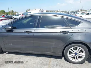 2018 Ford Fusion Hybrid SE with VIN 3FA6P0LU4JR261594, listed as a IAAI auction lot 40360797 with 128,533 mi miles. Bid and sale history available at carsss.com. Image 14.