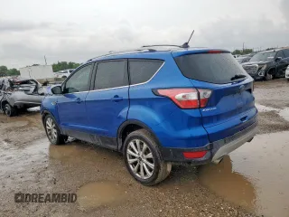 2018 Ford Escape Titanium with VIN 1FMCU9J98JUB31234, listed as a Copart auction lot 58817705 with 140,183 mi miles and Salvage title. Bid and sale history available at DreamBid. Image 2.