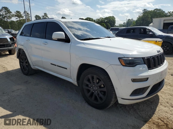 2018 Jeep Grand Cherokee High Altitude with VIN 1C4RJECG1JC260482, listed as a Copart auction lot 57310115 with 144,320 mi miles and Salvage title. Bid and sale history available at DreamBid. Image 4.