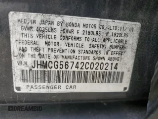 2002 Honda Accord SE z VIN JHMCG56742C020214, wystawiony jako Copart lot #56098805 z przebiegiem 256 147 mil mil oraz Szkoda całkowita • Salvage title. Historia ofert i sprzedaży dostępna na DreamBid. Obrazek 12.