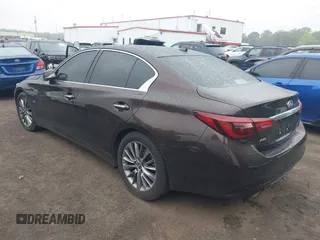 2019 Infiniti Q50 Luxe z VIN JN1EV7AR6KM550427, wystawiony jako IAAI lot #42225183 z przebiegiem 76 144 mil mil oraz . Historia ofert i sprzedaży dostępna na DreamBid. Obrazek 3.