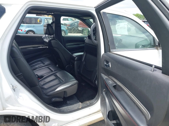 2015 Dodge Durango R/T with VIN 1C4SDJCT4FC938647, listed as a IAAI auction lot 42370175 with 179,686 mi miles and . Bid and sale history available at DreamBid. Image 8.