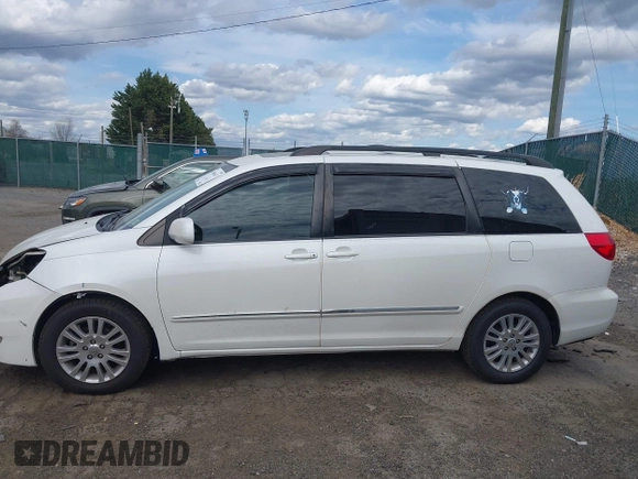 2009 Toyota Sienna XLE with VIN 5TDZK22C79S259793, listed as a IAAI auction lot 41905617 with 185,121 mi miles and . Bid and sale history available at DreamBid. Image 15.