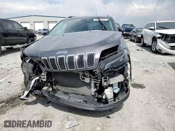 2020 Jeep Cherokee Latitude Plus with VIN 1C4PJMLB7LD554861, listed as a Copart auction lot 52379475 with 59,556 mi miles and Salvage Title. Bid and sale history available at DreamBid. Image 12.