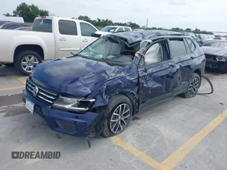 2021 Volkswagen Tiguan S with VIN 3VV1B7AX4MM150765, listed as a IAAI auction lot 42505134 with 19,590 mi miles and . Bid and sale history available at DreamBid. Image 2.