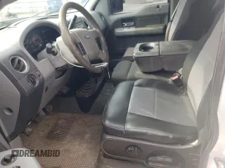 2007 Ford F-150 XL with VIN 1FTRF14V97KB65061, listed as a Copart auction lot 56280705 with 310,029 mi miles and Salvage title. Bid and sale history available at DreamBid. Image 7.