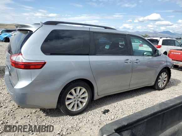 2015 Toyota Sienna Limited z VIN 5TDDK3DC5FS127754, wystawiony jako Copart lot #57437715 z przebiegiem 99 496 mil mil oraz Szkoda całkowita • Salvage title. Historia ofert i sprzedaży dostępna na DreamBid. Obrazek 3.