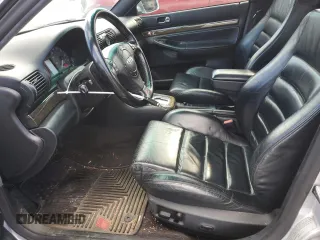 2000 Audi S4 z VIN WAUDD68D7YA179687, wystawiony jako Copart lot #77201694 z przebiegiem 165 118 mil mil oraz Szkody całkowita. Historia ofert i sprzedaży dostępna na DreamBid. Obrazek 7.
