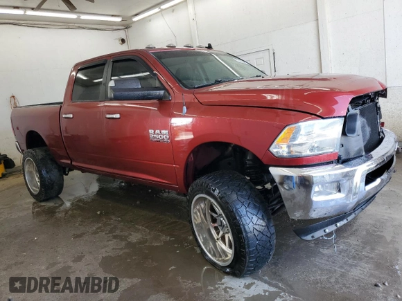 2014 Ram 2500 SLT with VIN 3C6UR5DL3EG122550, listed as a Copart auction lot 62482195 with 120,910 mi miles and Salvage title. Bid and sale history available at DreamBid. Image 4.