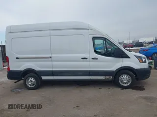 2023 Ford Transit Cargo with VIN 1FTBR2X87PKA51211, listed as a IAAI auction lot 41631315 with 42,688 mi miles and . Bid and sale history available at DreamBid. Image 13.