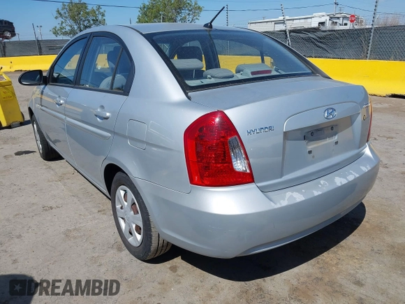 2007 Hyundai Accent GLS with VIN KMHCN46C57U087156, listed as a IAAI auction lot 42151298 with 81,588 mi miles. Bid and sale history available at carsss.com. Image 3.