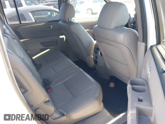 2012 Honda Pilot Touring with VIN 5FNYF3H91CB020673, listed as a IAAI auction lot 41721836 with 123,607 mi miles and . Bid and sale history available at carsss.com. Image 8.