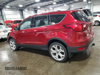 2019 Ford Escape Titanium with VIN 1FMCU9J9XKUA41715, listed as a Copart auction lot 57483725 with 30,644 mi miles and Salvage title. Bid and sale history available at DreamBid. Image 2.
