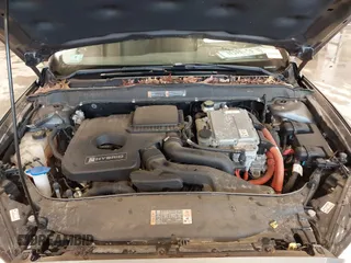 2014 Ford Fusion SE Hybrid with VIN 3FA6P0LU5ER310629, listed as a IAAI auction lot 41941852 with 53,739 mi miles. Bid and sale history available at carsss.com. Image 10.