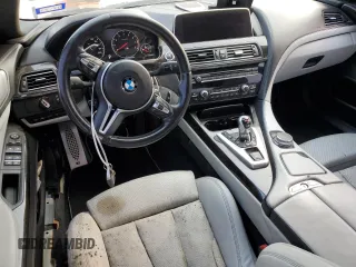 2017 BMW M6 z VIN WBS6E9C56HG437374, wystawiony jako Copart lot #54277624 z przebiegiem 80 858 mil mil oraz . Historia ofert i sprzedaży dostępna na DreamBid. Obrazek 8.