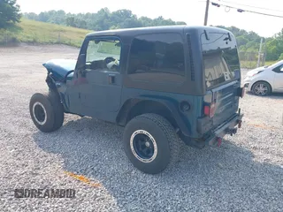 1998 Jeep Wrangler Sport with VIN 1J4FY19S2WP786844, listed as a IAAI auction lot 42382789 with 306,228 mi miles and . Bid and sale history available at DreamBid. Image 3.
