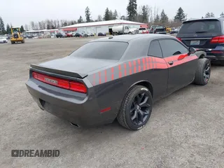 2014 Dodge Challenger R/T Plus z VIN 2C3CDYBT1EH177266, wystawiony jako IAAI lot #41798977 z przebiegiem 109 489 mil mil oraz . Historia ofert i sprzedaży dostępna na DreamBid. Obrazek 4.