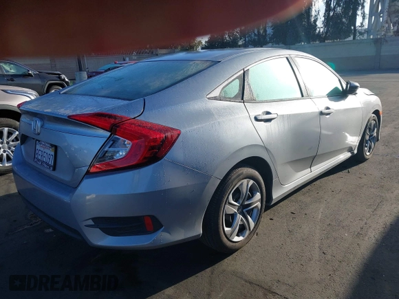 2018 Honda Civic LX with VIN 2HGFC2F58JH571072, listed as a IAAI auction lot 41684450 with 66,032 mi miles and . Bid and sale history available at carsss.com. Image 4.