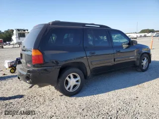 2005 GMC Envoy XL SLT with VIN 1GKET16S256109757, listed as a Copart auction lot 77220144 with 246,444 mi miles and Salvage Title. Bid and sale history available at carsss.com. Image 3.
