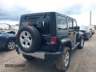 2013 Jeep Wrangler Unlimited Sahara with VIN 1C4BJWEG2DL549864, listed as a IAAI auction lot 42250556 with 231,018 mi miles and . Bid and sale history available at DreamBid. Image 4.