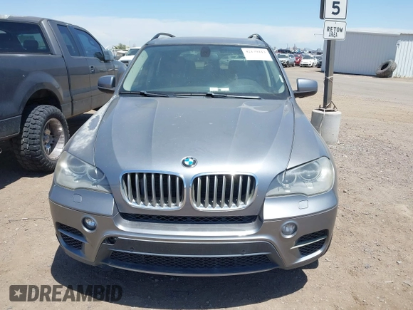 2013 BMW X5 xDrive50i with VIN 5UXZV8C56D0C15064, listed as a IAAI auction lot 42179213 with Not provided miles and . Bid and sale history available at DreamBid. Image 11.