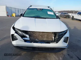 2022 Hyundai Tucson SEL with VIN 5NMJCCAE7NH158933, listed as a IAAI auction lot 41531628 with 57,996 mi miles and . Bid and sale history available at DreamBid. Image 6.