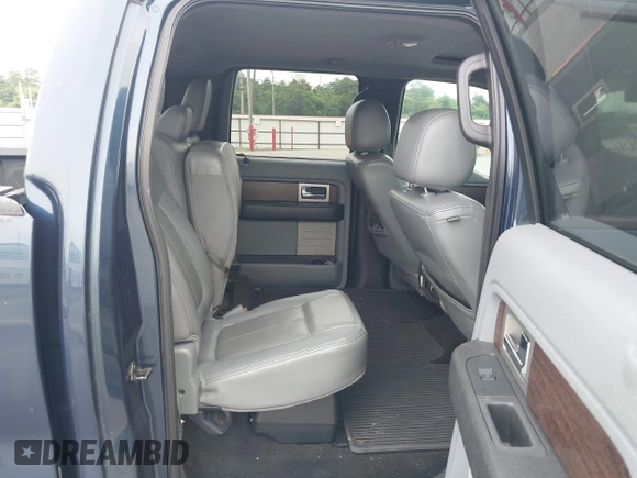 2013 Ford F-150 XL with VIN 1FTFW1ETXDKF51063, listed as a IAAI auction lot 42790441 with 303,665 mi miles and . Bid and sale history available at DreamBid. Image 8.