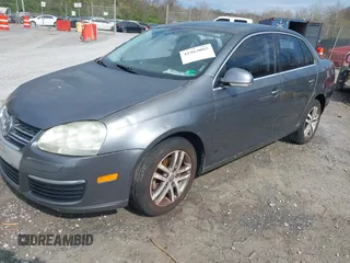 2005 Volkswagen Jetta Sedan 2.5L with VIN 3VWSG71K35M617763, listed as a IAAI auction lot 41963065 with 200,915 mi miles. Bid and sale history available at carsss.com. Image 2.
