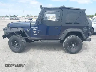 1997 Jeep Wrangler Sport with VIN 1J4FY19S2VP481780, listed as a IAAI auction lot 41822213 with 156,629 mi miles. Bid and sale history available at carsss.com. Image 14.