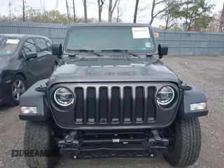 2021 Jeep Wrangler Unlimited Willys with VIN 1C4HJXDN5MW683251, listed as a IAAI auction lot 42075844 with 42,340 mi miles and . Bid and sale history available at DreamBid. Image 12.