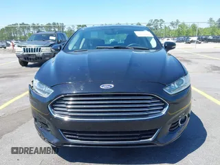 2016 Ford Fusion Titanium with VIN 3FA6P0K9XGR158234, listed as a IAAI auction lot 42043716 with 161,164 mi miles. Bid and sale history available at carsss.com. Image 12.