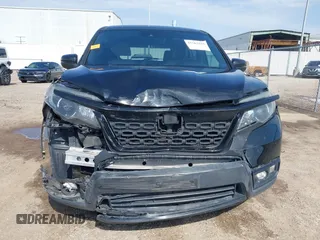 2019 Honda Passport EX-L with VIN 5FNYF7H59KB003011, listed as a IAAI auction lot 41563219 with 78,239 mi miles and . Bid and sale history available at carsss.com. Image 6.