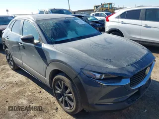 2024 Mazda CX-30 2.5 S Carbon Edition with VIN 3MVDMBCM7RM604170, listed as a IAAI auction lot 41388389 with 4,164 mi miles. Bid and sale history available at carsss.com. Image 1.