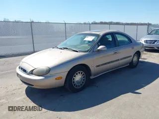 1998 Mercury Sable LS z VIN 1MEFM53S9WG642269, wystawiony jako IAAI lot #41737380 z przebiegiem 222 896 mil mil oraz . Historia ofert i sprzedaży dostępna na DreamBid. Obrazek 2.