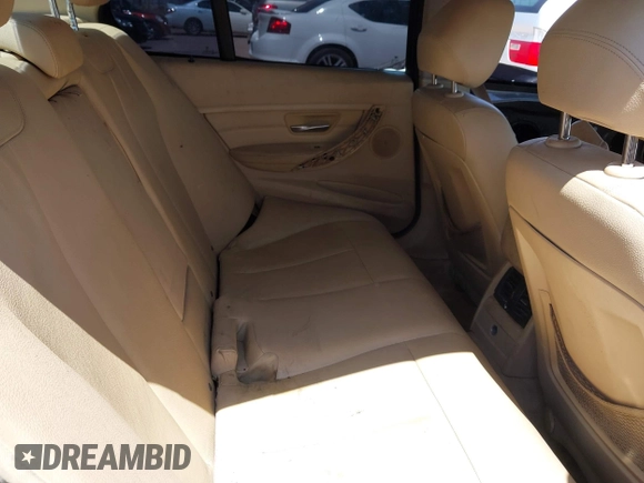 2015 BMW 3 Series 328i with VIN WBA3A5C51FF608143, listed as a IAAI auction lot 42387613 with 92,964 mi miles and . Bid and sale history available at DreamBid. Image 8.