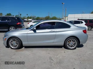2015 BMW 2 Series 228i with VIN WBA1F5C58FV257570, listed as a IAAI auction lot 41783929 with 229,893 mi miles. Bid and sale history available at carsss.com. Image 14.