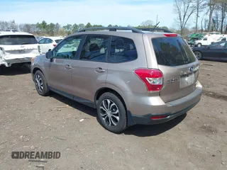 2014 Subaru Forester 2.5i Premium with VIN JF2SJAEC4EH421695, listed as a IAAI auction lot 42112832 with 188,793 mi miles. Bid and sale history available at carsss.com. Image 3.