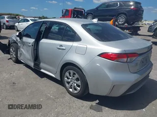 2020 Toyota Corolla LE with VIN 5YFEPRAEXLP125579, listed as a IAAI auction lot 41840413 with 65,672 mi miles. Bid and sale history available at carsss.com. Image 3.