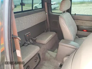 2000 Toyota Tacoma with VIN 4TAWN72N8YZ677345, listed as a Copart auction lot 61096865 with 217,590 mi miles and Clean title. Bid and sale history available at DreamBid. Image 10.