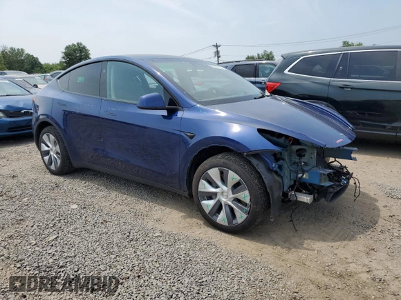 2024 Tesla Model Y Long Range z VIN 7SAYGDEE8RA248635, wystawiony jako Copart lot #59130125 z przebiegiem 21 210 mil mil oraz Szkoda całkowita • Salvage title. Historia ofert i sprzedaży dostępna na DreamBid. Obrazek 4.