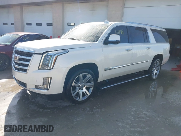 2015 Cadillac Escalade ESV Premium z VIN 1GYS4TKJ9FR700022, wystawiony jako IAAI lot #41748188 z przebiegiem 166 416 mil mil oraz . Historia ofert i sprzedaży dostępna na DreamBid. Obrazek 17.