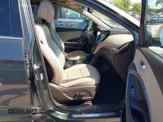 2014 Hyundai Santa Fe with VIN 5XYZUDLB0EG187984, listed as a IAAI auction lot 42607599 with 111,594 mi miles and . Bid and sale history available at DreamBid. Image 5.